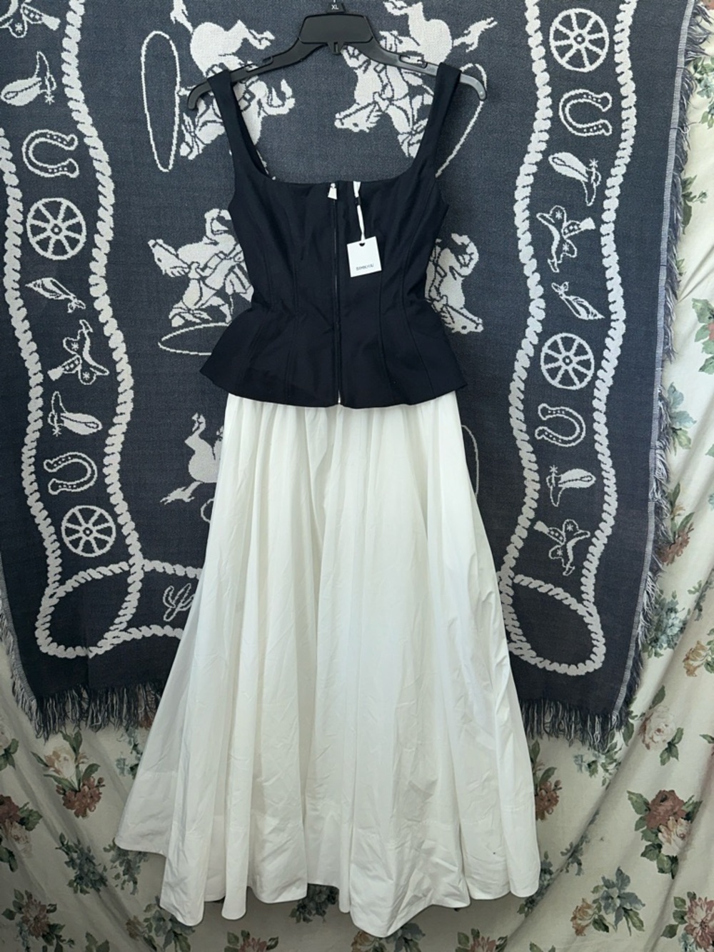 Elegant Black Peplum Top with White Full Skirt — Classic Two-Tone Skater Set
